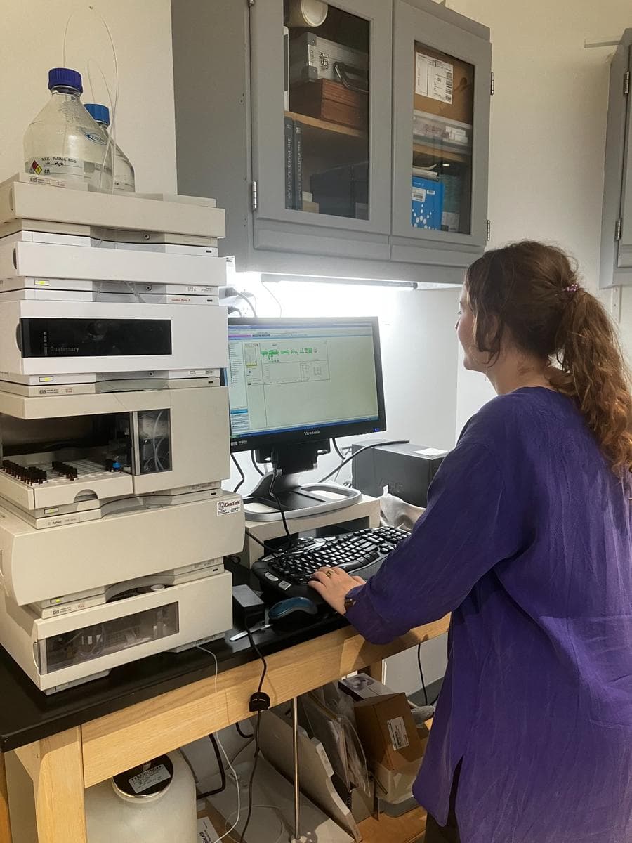 Microscope and textile sample under research lighting